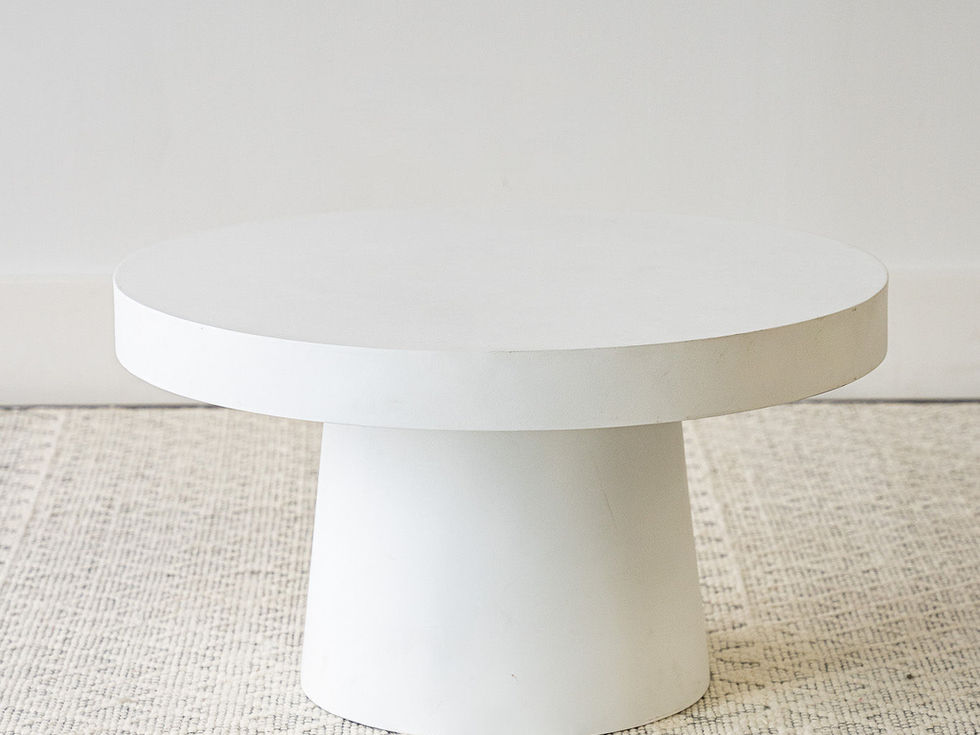 white faux concrete round coffee table