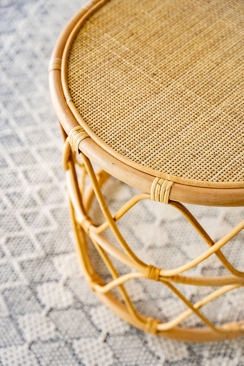 wood rattan weave round accent table angled view