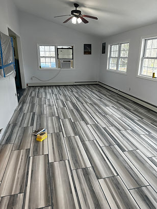 grey and white tiles living room floor