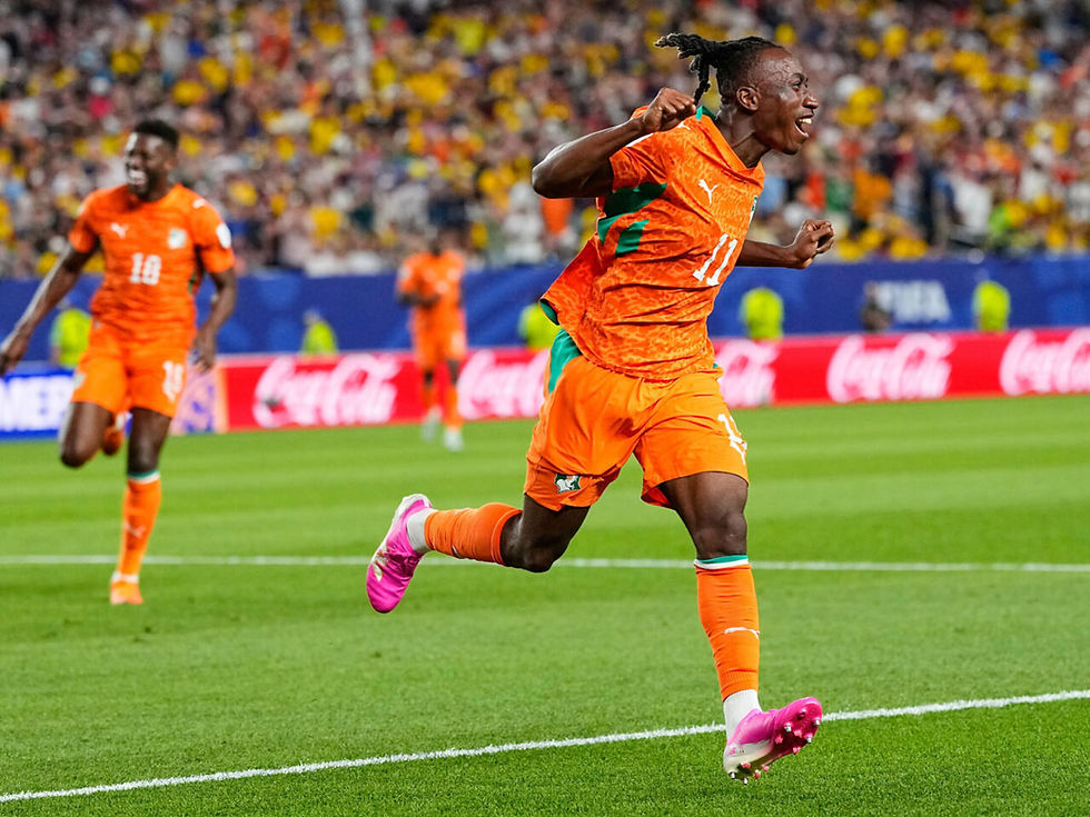 Le Côte-d'Ivoirien Yan Diomande (11) exulte après que son coéquipier Amad Diallo a inscrit le premier but de son équipe lors du mondial face à l'Équateur à Philadelphie, le dimanche 14 juin 2026. © AP Photo/Petr David Josek - Petr David Josek