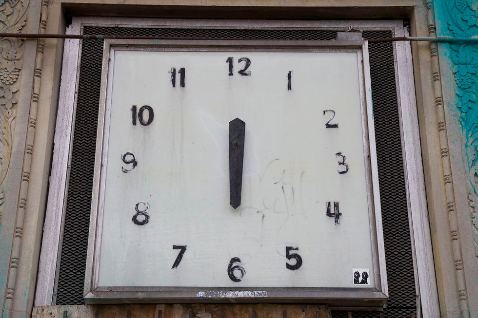 Clock above the entrance to the abandoned CPA Building on Michigan Avenue, Corktown