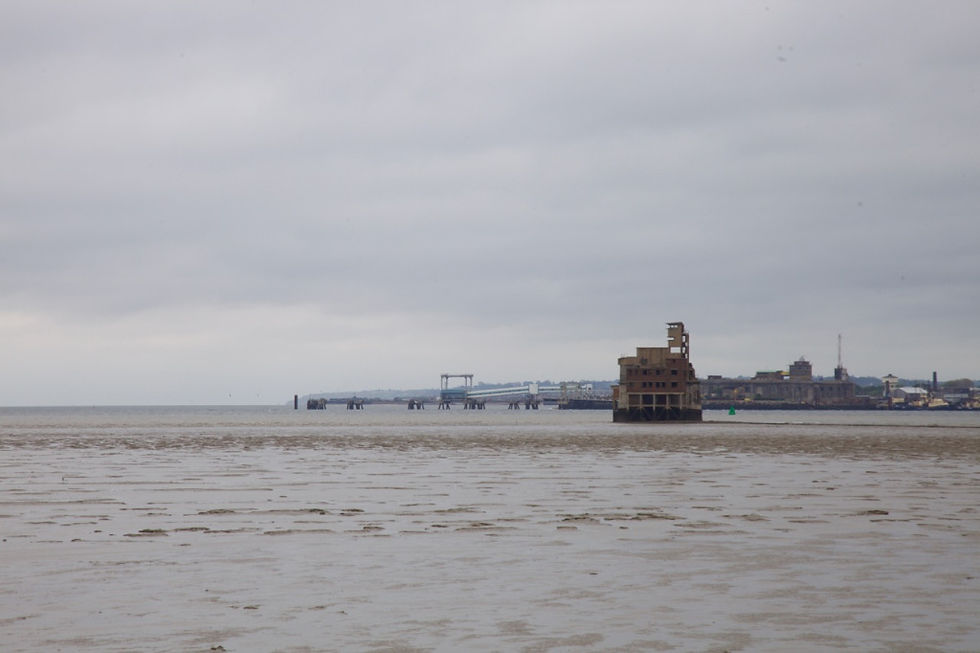 The Grain Tower at high tide from the mouth of the River Medway