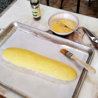 Brush with the egg wash.