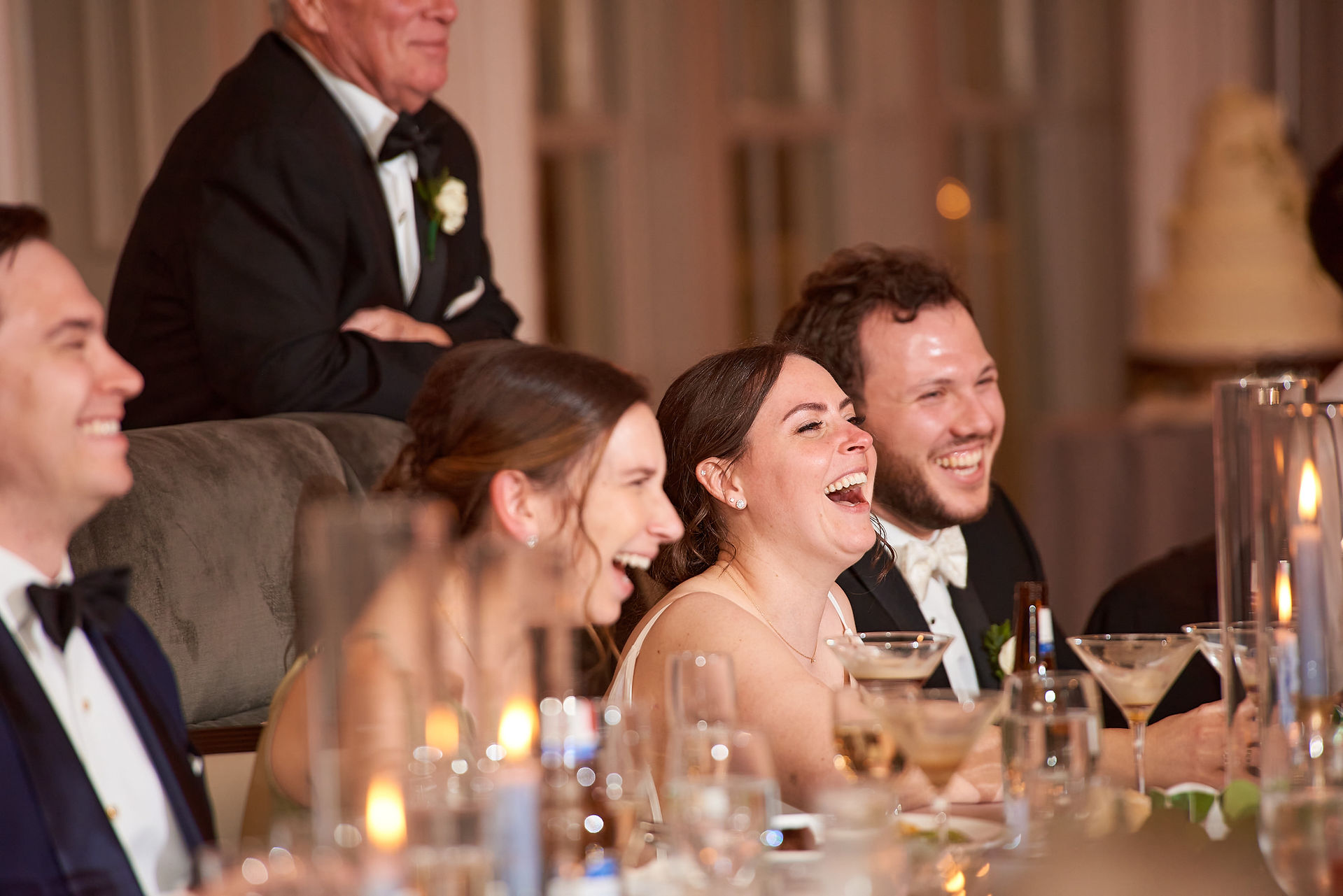 laugher bride and groom