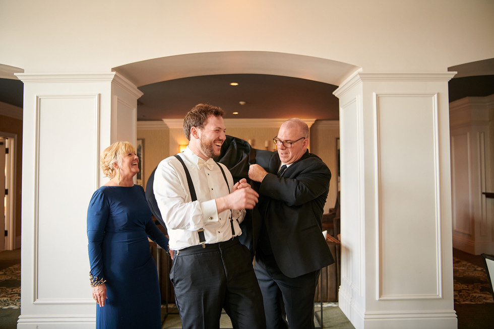 being silly with groom parents