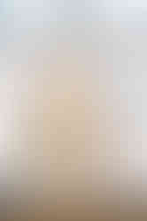 wedding dress hung up in window