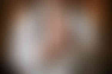 groom putting on watch getting ready rivercrest wedding