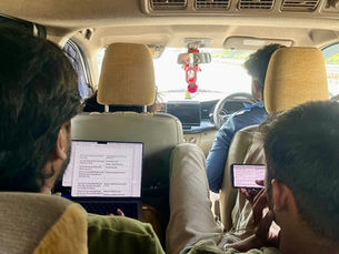 The Qurious Studio team in pre-production discussion developing a story-first approach for a film project in India