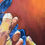 Thumbnail: Manos pidiendo con nudos azules (Asking Hands with blue ribbons)