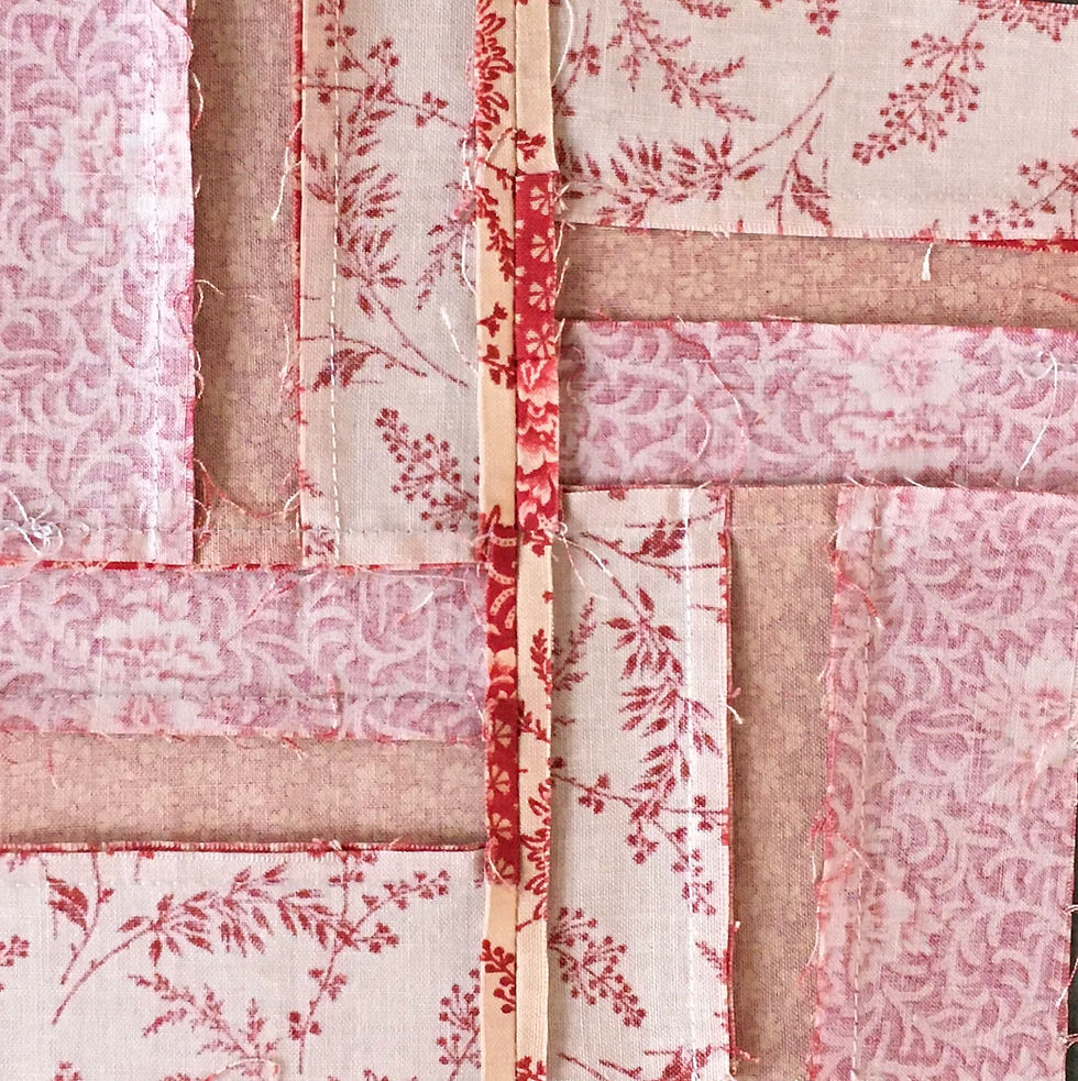 The wrong side of a completed rail fence quilt block