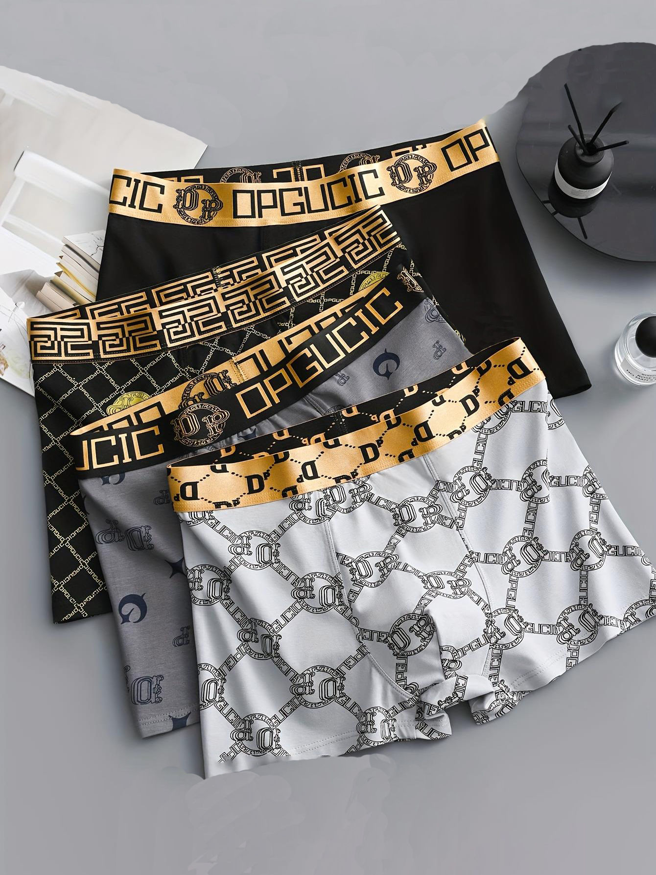 “Kit com 4 Cuecas Boxer Masculinas Luxo Estampadas – Cintura Dourada, Macias e R