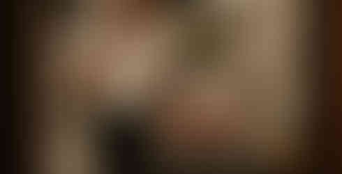 A man standing next to an Vintage AMP