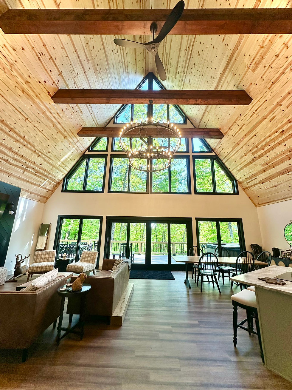 Great room with vaulted wood ceilings