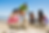 African American man, woman, two girls building a sand castle on a beach, ocean and sky in background