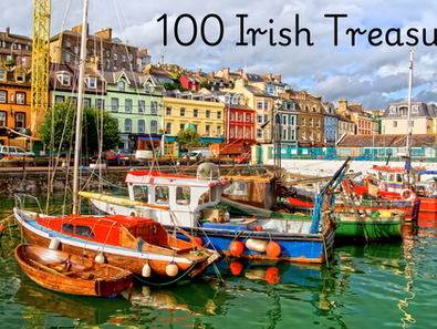 waterfront buildings, colorful boats in water