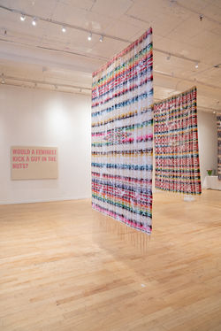 Installation view of "What Is She Made Of?" featuring work from the series "It's All Just Talk" (lef