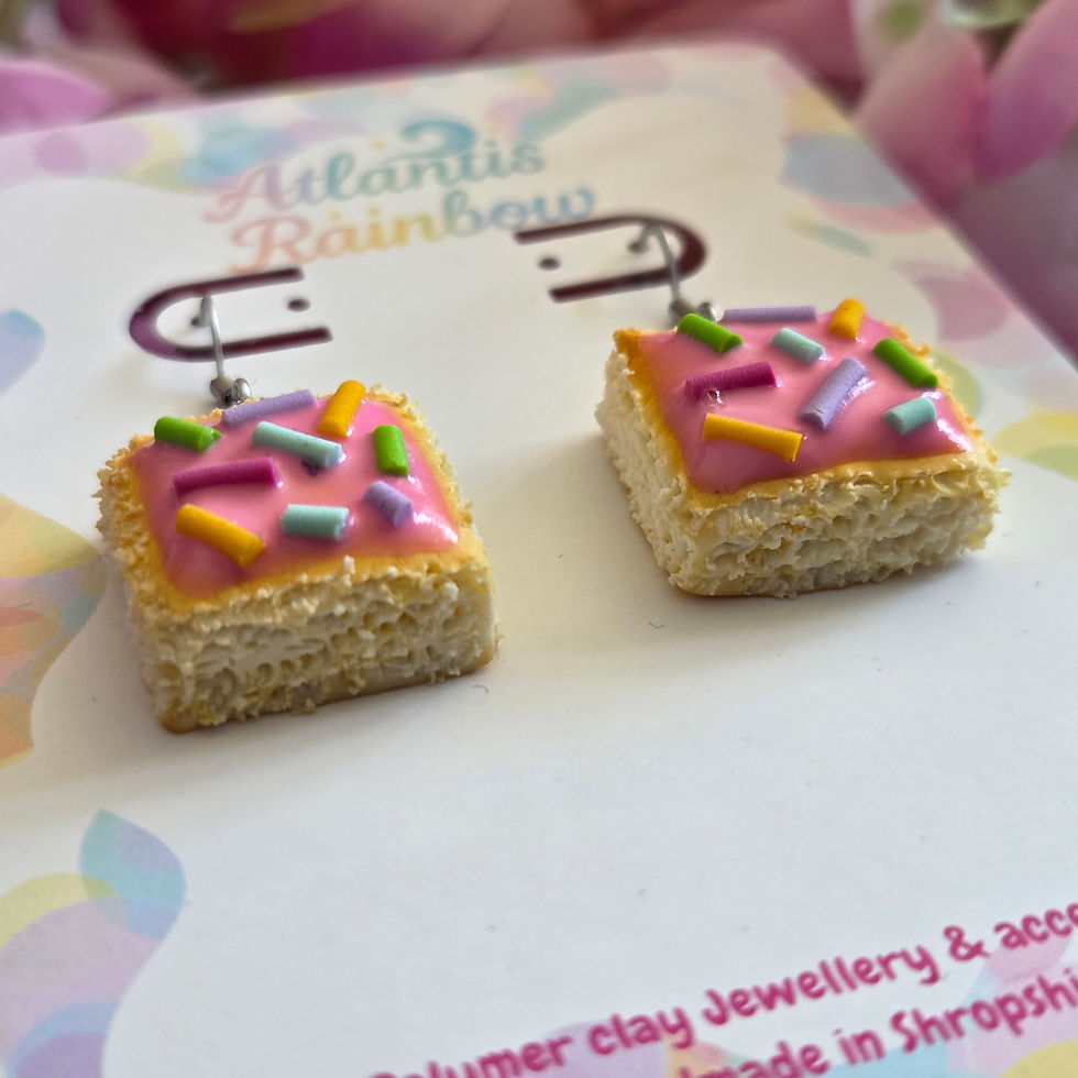 Thumbnail: Old school cake earrings (pink icing)