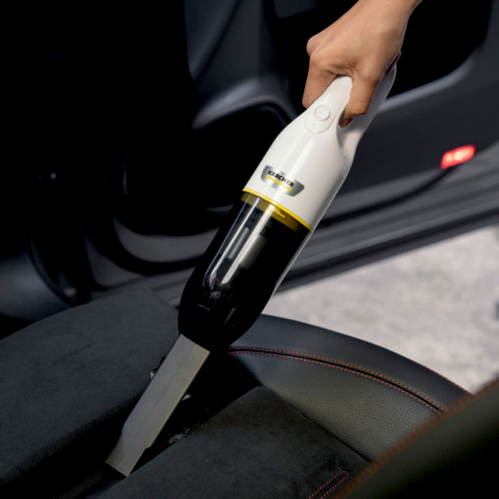 Thumbnail: Handheld vacuum cleaner cleaning car seat interior; detail shot of the process.