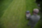 rear-view-man-photographing-field_edited.jpg