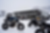 A panoramic winter shot of TYCENTRE vehicles parked outside a service center, showcasing their rugged build quality even in cold conditions.