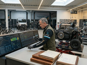 AdvancedPro ebike expert reviewing technical performance data and hardware maintenance logs for a collection of high-performance electric vehicles.