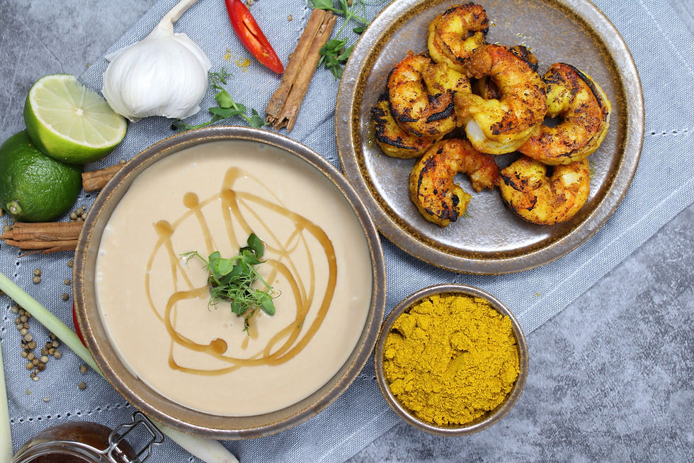 Gebeefte Curry-Garnelen mit Miso-Kokossüppchen und Sesamöl