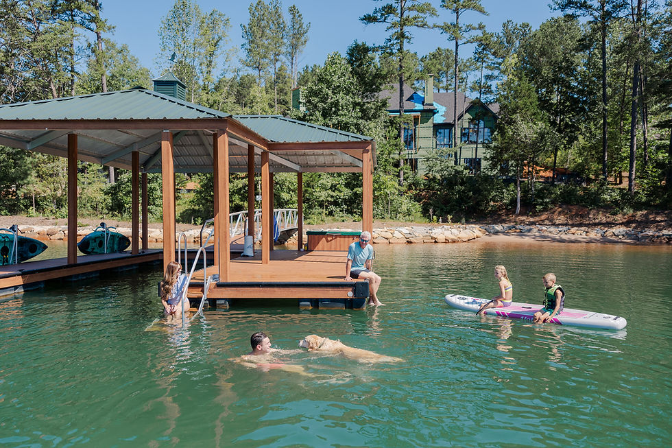 Family enjoying lake activities near dock accessories.