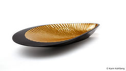decorative centerpiece in lacquered wood and interior covered with gold leaf