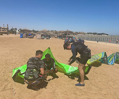 Students preparing kitesurf gear