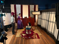 BTS photo from We Meet Again. On the set of a Joseon Period Shaman temple. Production Design by Sophia M JAcobs