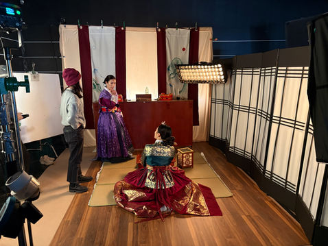 BTS photo from We Meet Again. On the set of a Joseon Period Shaman temple. Production Design by Sophia M JAcobs