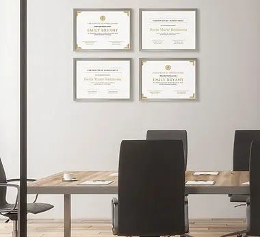 Certificate-frames-on-office-wall.webp