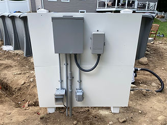 Pool sub panel with timer and outlets installed on a white PVC support board all installed by Steven M Parker Electric in the great city of Haverhill MA.