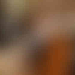 Family event photography in Bristol showing a young boy seated in church during a ceremony