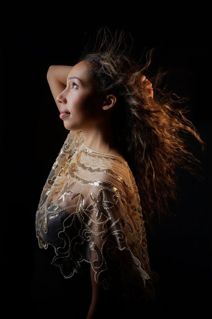 Creative fine art portrait of a woman with expressive movement captured in my Bristol portrait studio