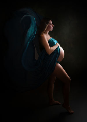 silhouette maternity portrait with flowing teal fabric Bristol maternity photography