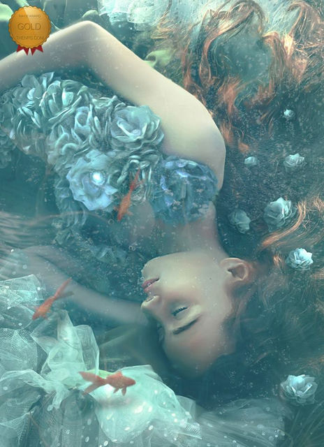 Surreal underwater fine art portrait with flowing fabric, creative Photoshop composite artwork