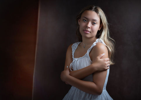 Soft studio portrait of a young woman photographed by a Bristol portrait photographer