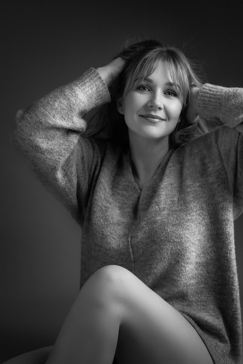 confident professional portrait with relaxed posture and expression