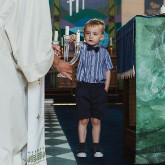 Professional event photography of a child taking part in a church service in Bristol