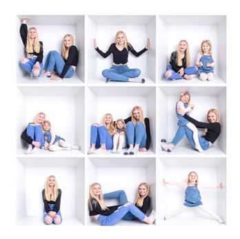 In the Box family photography session featuring two sisters posing together in a bright white box studio