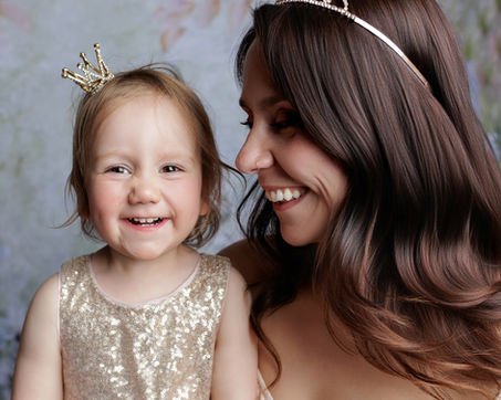 Mother and toddler sharing a smile during a Mother’s Day mini photoshoot in Bristol