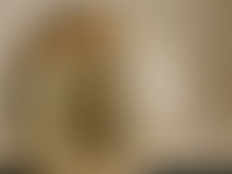 Close-up of a vintage globe showing Asia, with a metal axis. Warm lighting highlights the detailed map, evoking a sense of exploration.