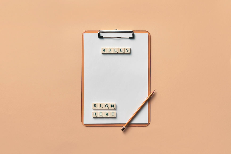 Clipboard with "RULES" and "SIGN HERE" in letter tiles, and an orange pencil on a peach background. Mood is formal.