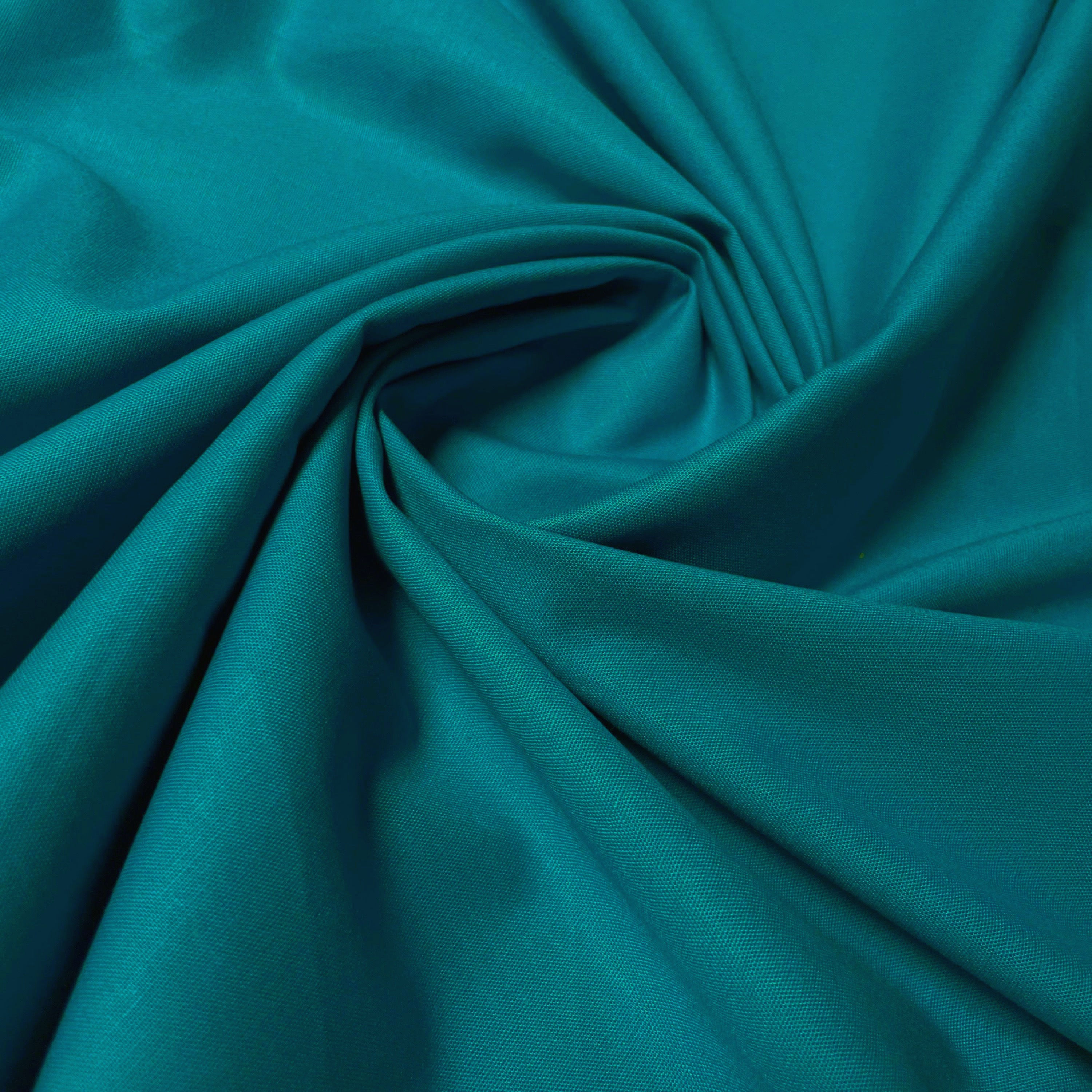 Baumwollstoff in hellpetrol