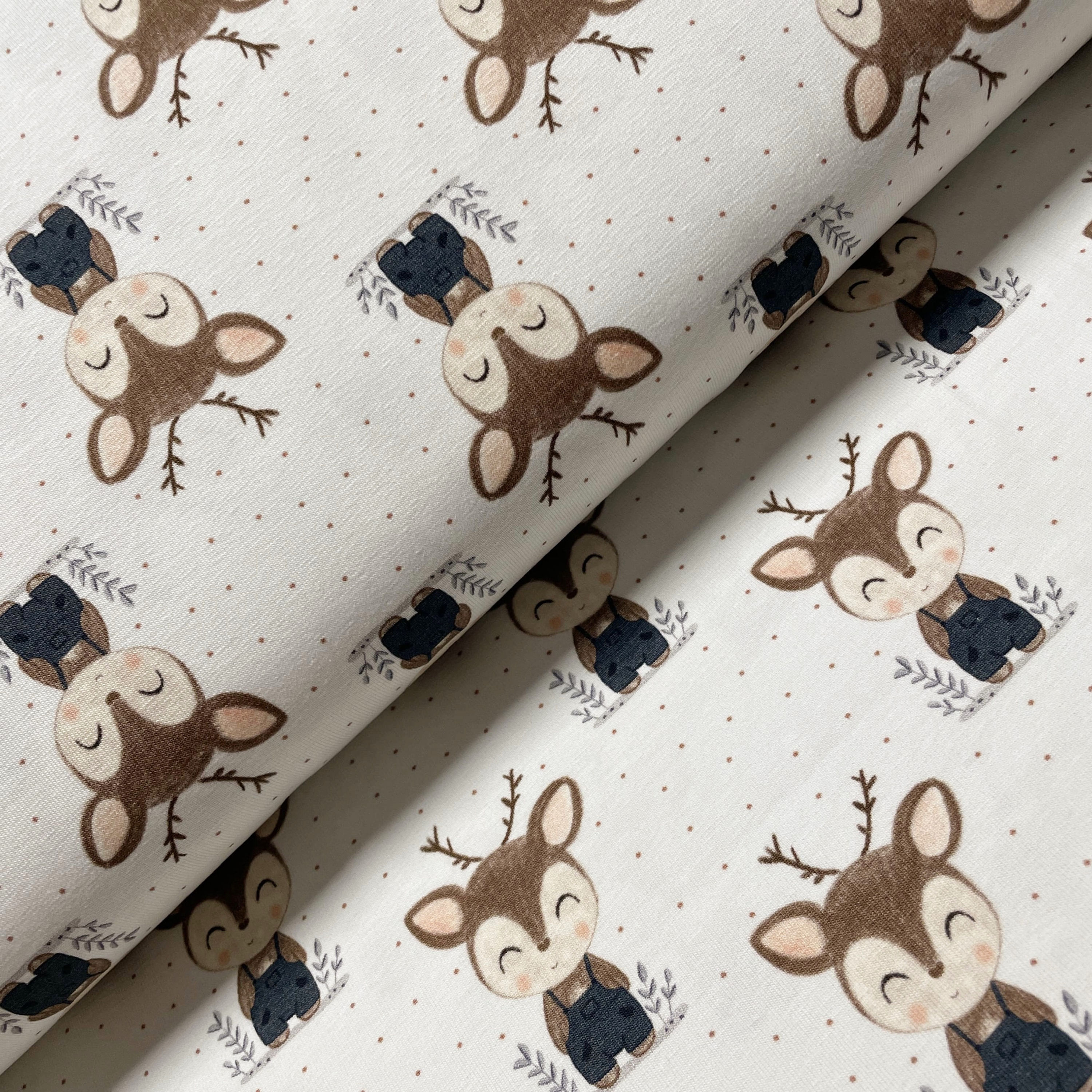 Jersey mit Rentieren, auf dem Stoffballen