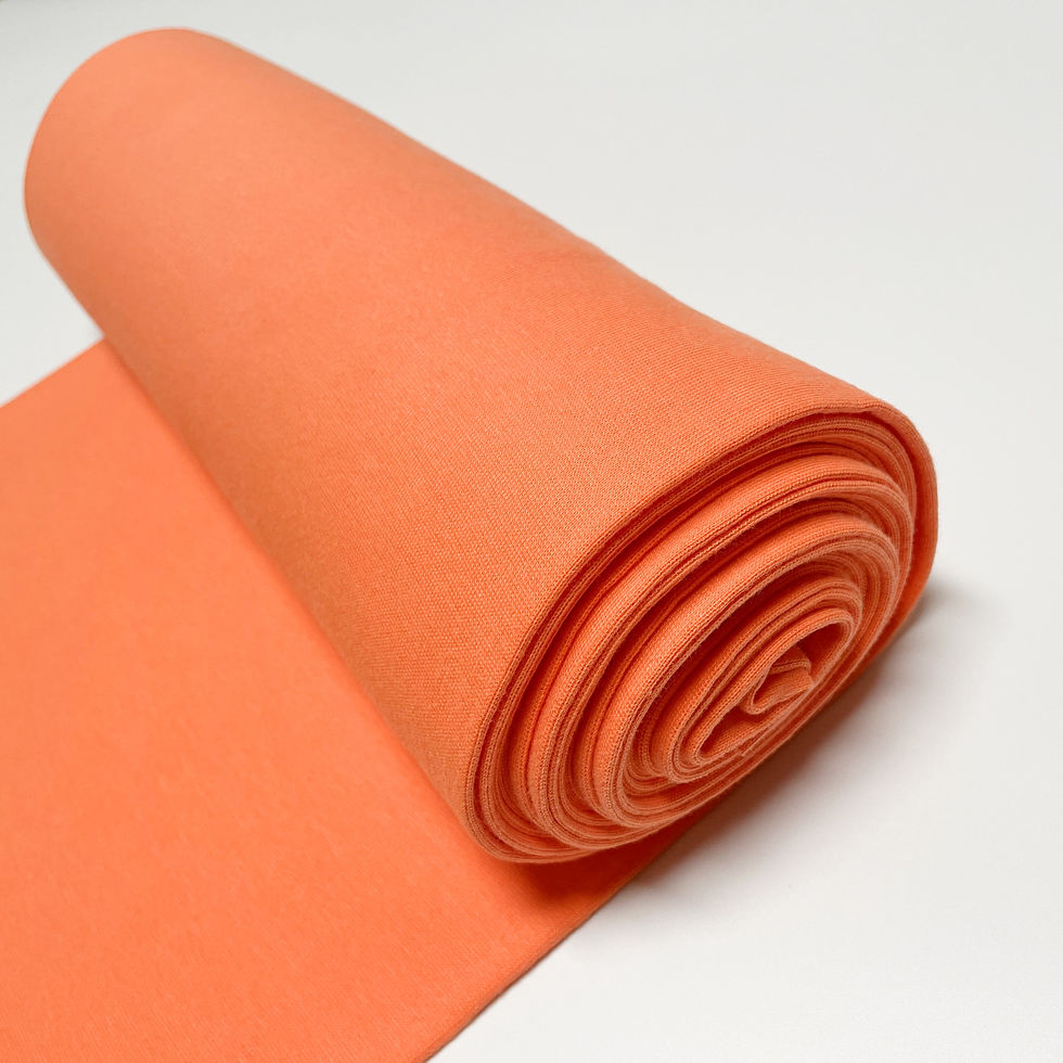 Bio-Bündchenstoff in aprikot, auf der Rolle