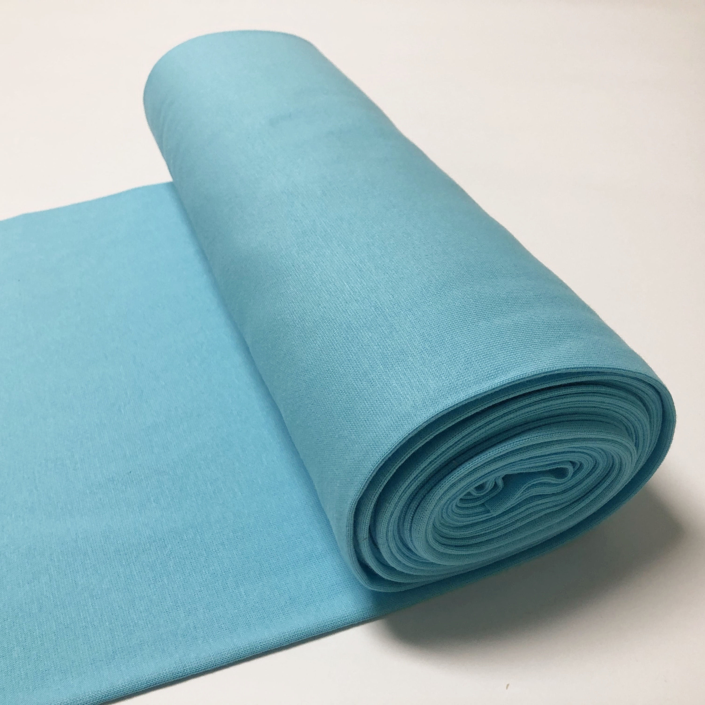 Bio-Bündchen in helltürkis, auf der Rolle