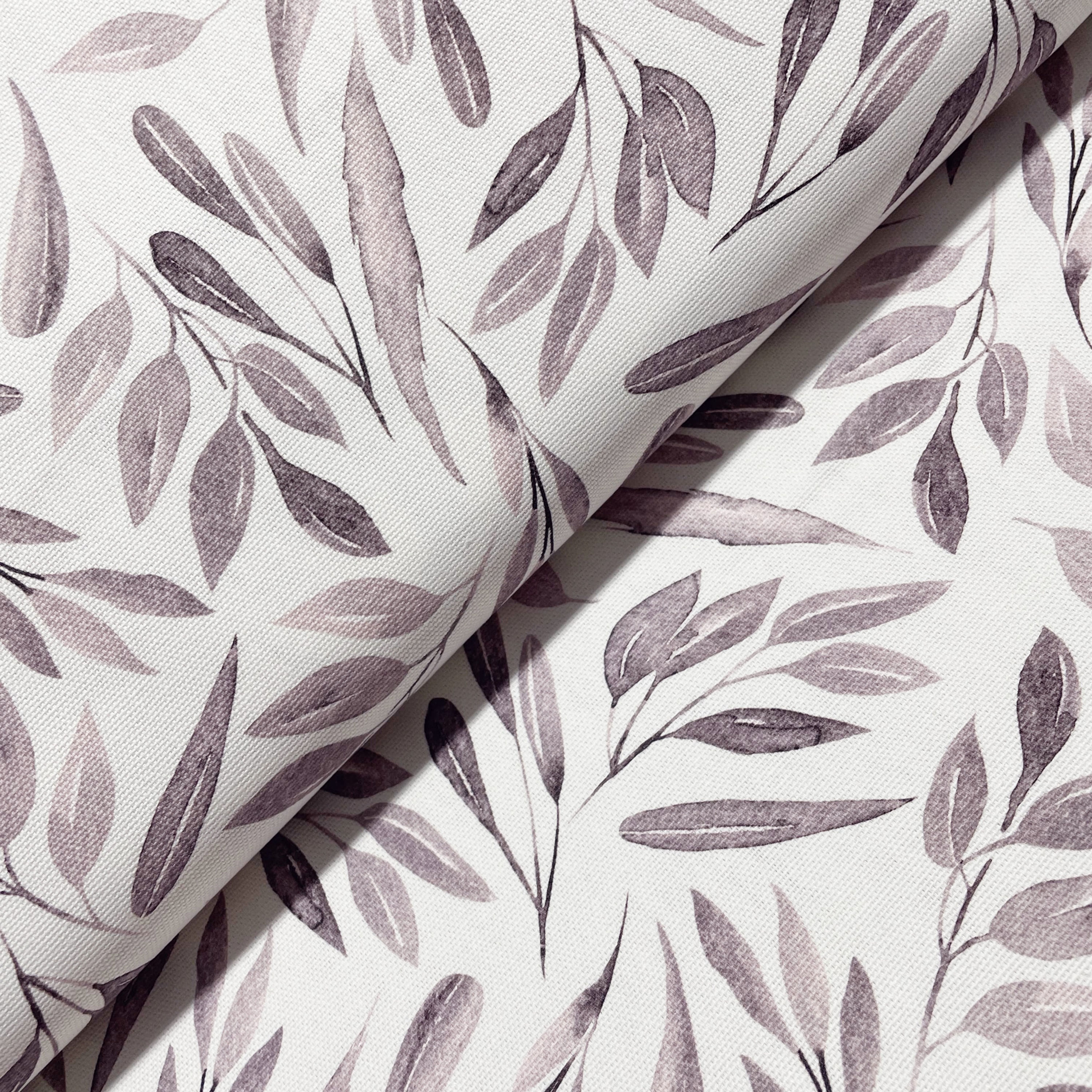 Canvas mit zarten Blättern, auf dem Stoffballen