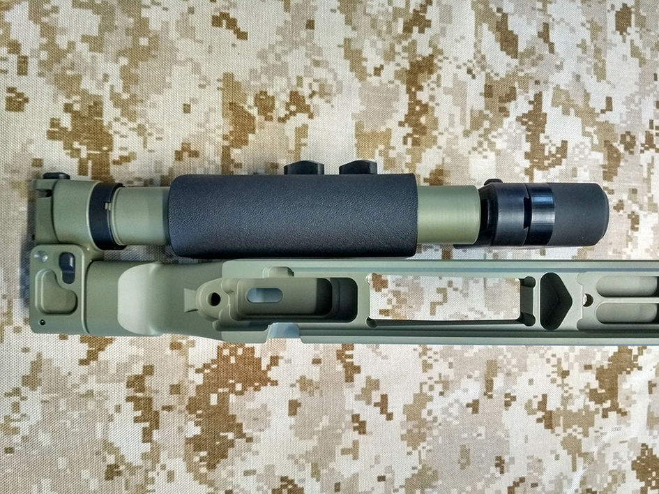 KPYK CRC 9038 On Chassis — Detailed shot of the folding adapter integrated into a precision rifle setup.